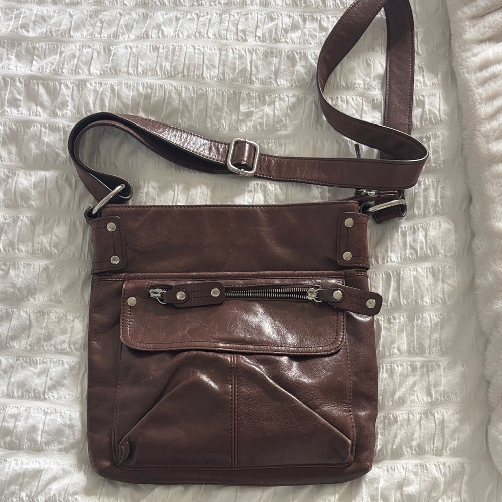 Danier Elegant Brown Leather Messenger Bag with Silver Hardware